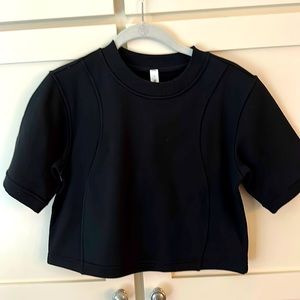 Black Lululemon thick black shirt. (Light sweatshirt material)